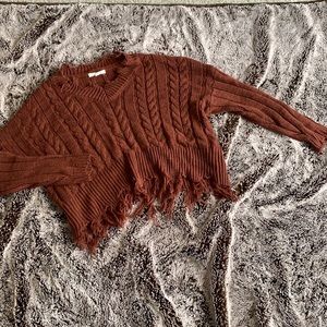 Cropped distressed sweater